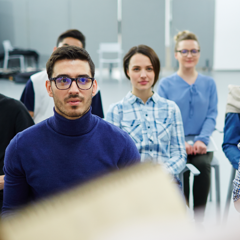 A group of individuals participating in a training.