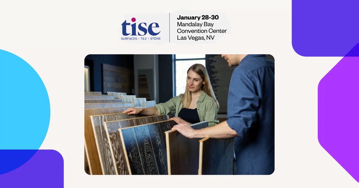 Two individuals examining a wide array of wood flooring options