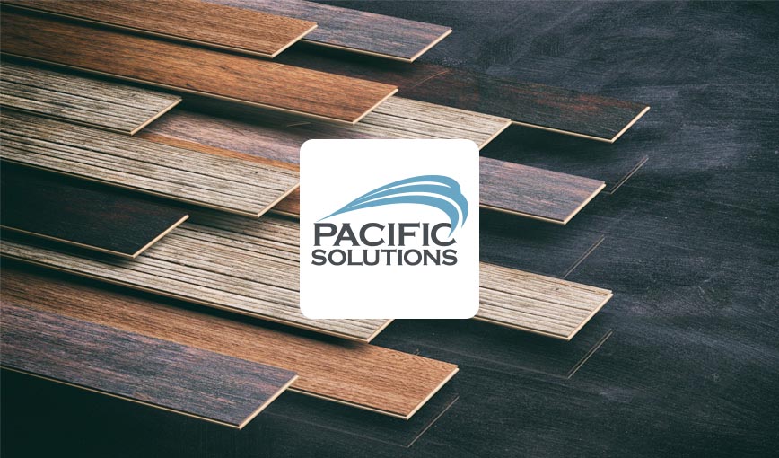 Pacific Solutions logo on wooden floor.