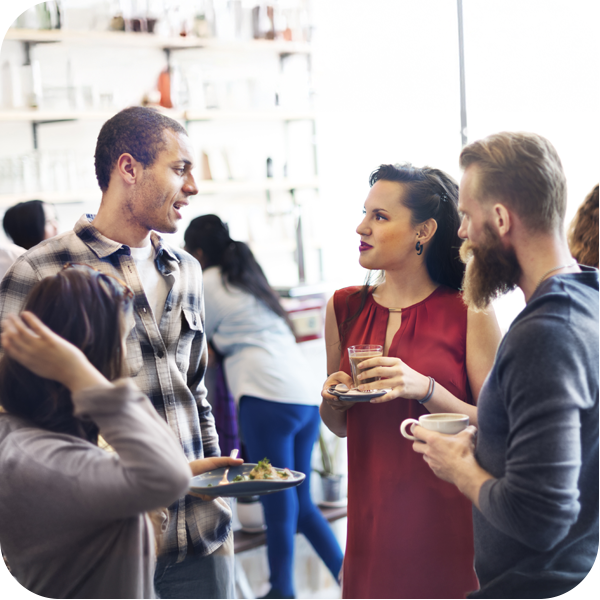 A diverse group of individuals engaged in conversation