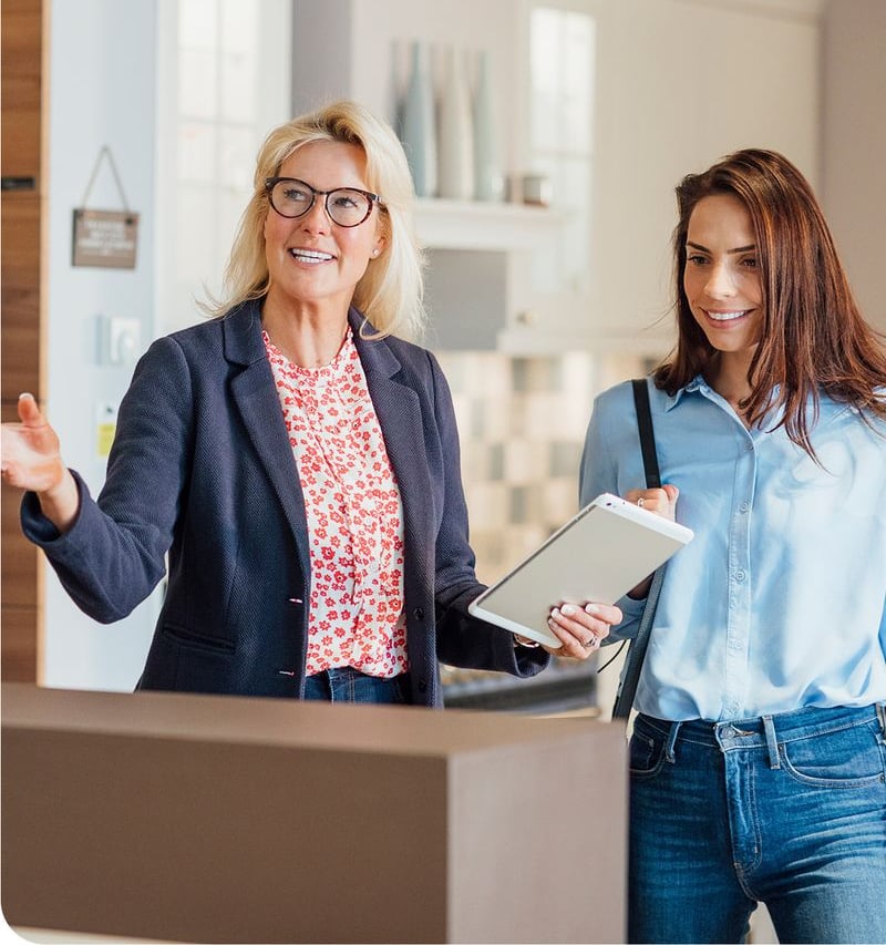 Saleswoman talking with a client