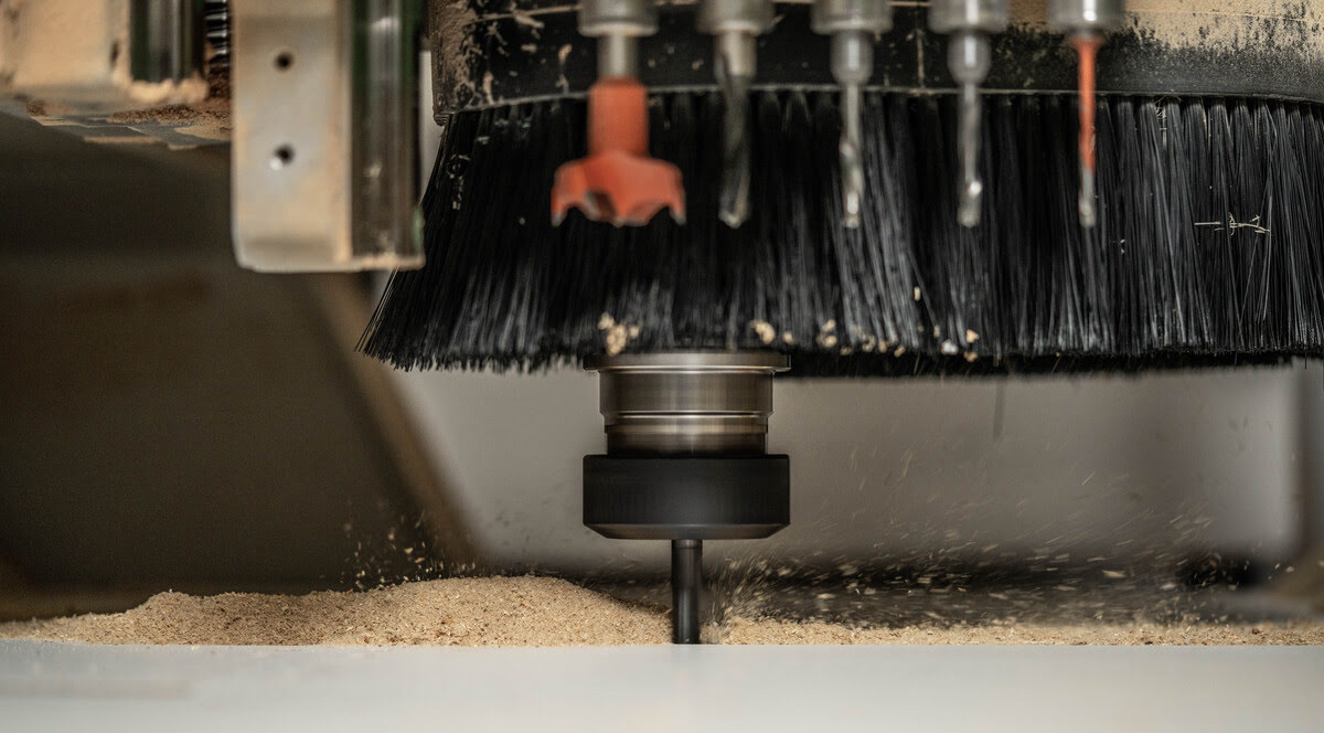 A CNC machine cuts wood